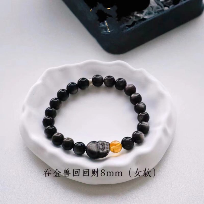 The PI Xiu Silver Obsidian bracelet with natural yellow crystal bracelet design is a couple's jewelry for giving as a gift
