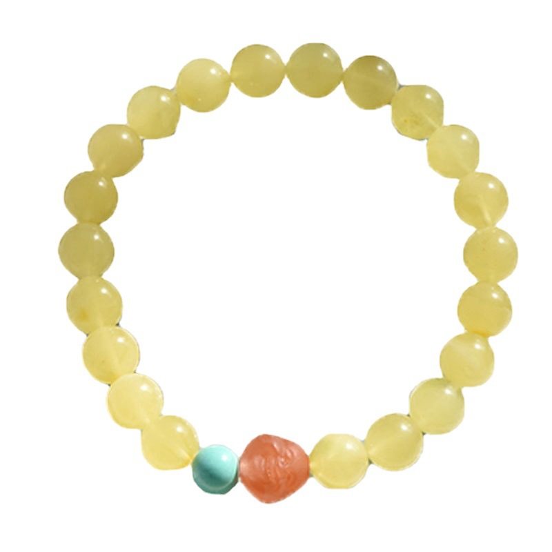 A simple, fashionable and elegant women's amber bracelet with a turquoise red Buddha head is available for one-piece delivery