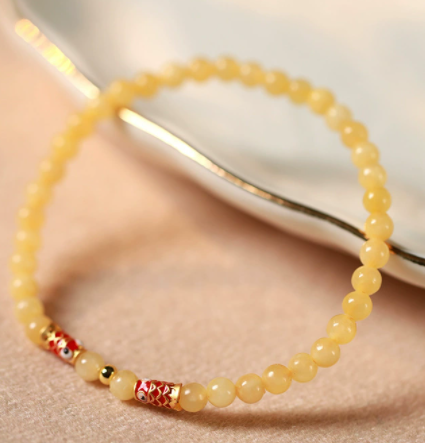 Wholesale of 4mm fine Jingtai blue koi and yellow jade bracelet, second-generation purple gold sand amber female koi ashore bracelet