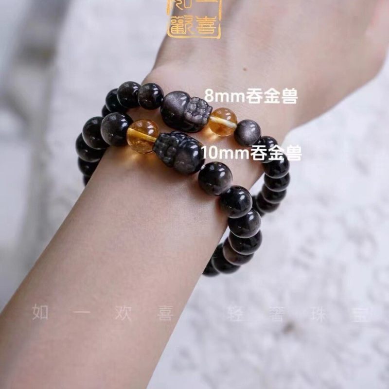 The PI Xiu Silver Obsidian bracelet with natural yellow crystal bracelet design is a couple's jewelry for giving as a gift
