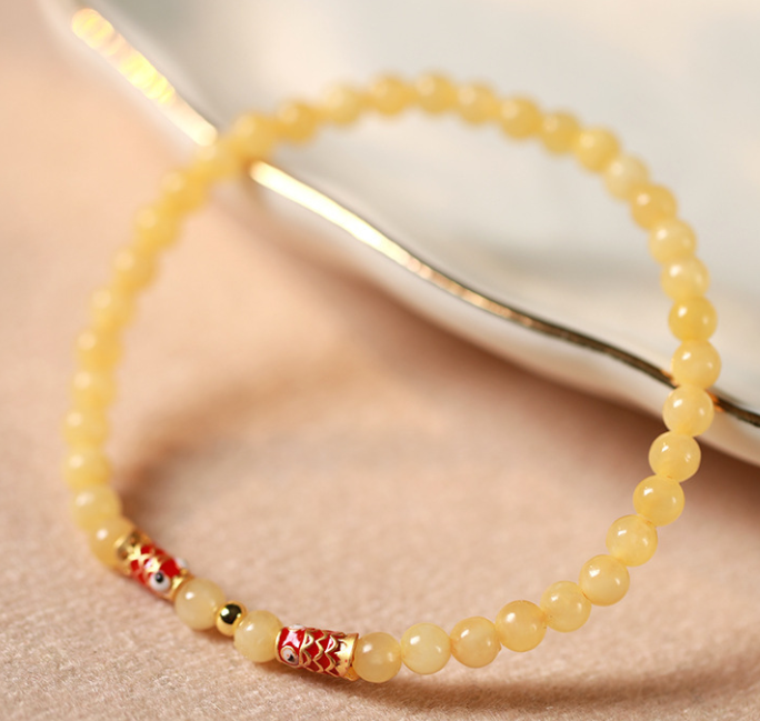 Wholesale of 4mm fine Jingtai blue koi and yellow jade bracelet, second-generation purple gold sand amber female koi ashore bracelet